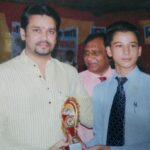 Ajay receiving 1st prize from Central Minister Anurag Thakur in 2014