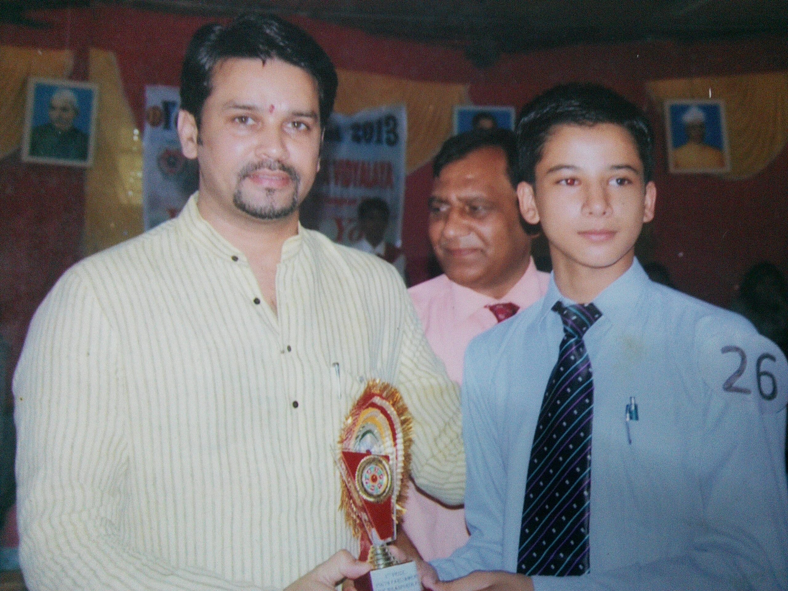 Ajay receiving 1st prize from Central Minister Anurag Thakur in 2014